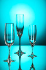 Wine glasses against colourful background