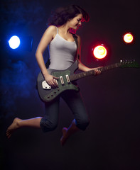 Fototapeta premium Beautiful girl with a guitar