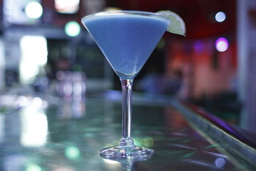 cocktail on the counter at a bar