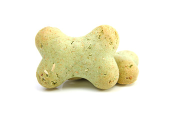 Green dog cookies over white background