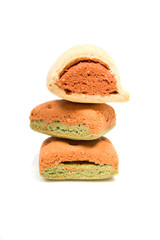 Pile of dog cookies over white background