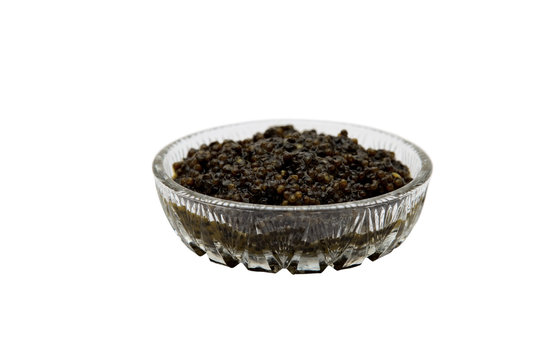 black caviar on white background. Isolated object