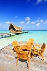 chair and table at beach of maldives