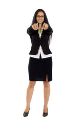 Fototapeta premium Young smiling business woman pointing