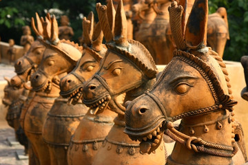 terracotta clay unglazed ceramic horses