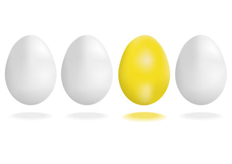 Line of eggs with gold egg in the middle