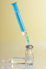 medicine vials and syringe