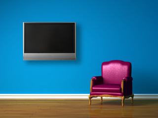 Purple chair with LCD tv in blue minimalist interior - obrazy, fototapety, plakaty
