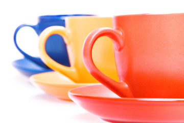 Color cups isolated on white background.