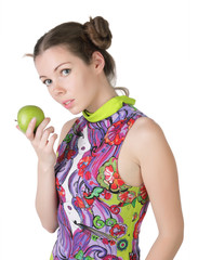 The girl with an apple, isolated on white background