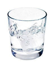 Water or alcohol splashing from ice cube dropped in a glass