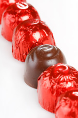 chocolate candy in red foil.