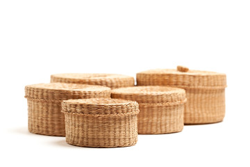 Various Sized Wicker Baskets on White