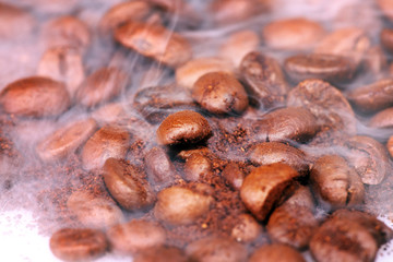 fragrant fried coffee beans with smoke