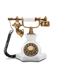 Vintage telephone on white