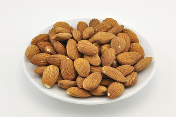 Almond appetizer on white plate