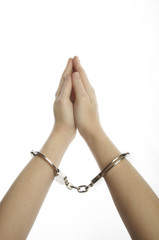 Hands and handcuffs