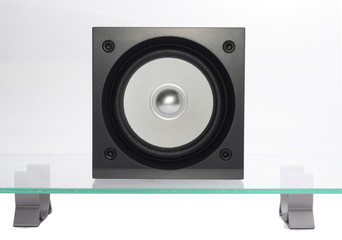 Fototapeta premium broadband speaker on the glass table.