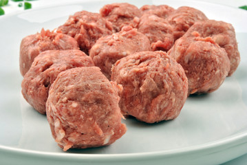 meat balls with organic parsley on a plate
