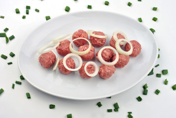 meat balls with organic parsley on a plate
