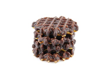 Chocolate belgian waffles stacked on white