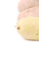 Bunch of potatoes on white