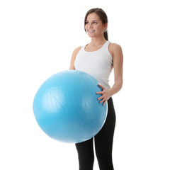 Young happy woman doing fitness exercise