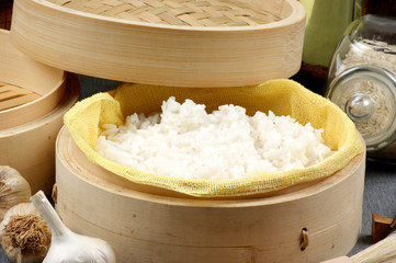 organic rice steamed in a bamboo steamer