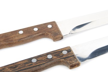 Close-up of wooden kitchen knifes on white