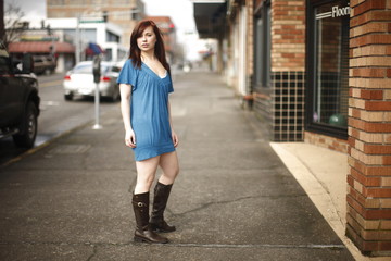 Young woman on sidewalk