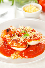 stuffed eggs with tomato cheese