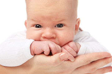 Little boy on mothers hands.