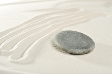 Fototapeta na wymiar stone on sand