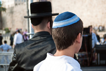Hassidic Jewish man with religious youth old city Jerusalem