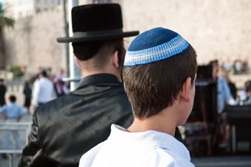 Foto auf Leinwand Hassidic Jewish man with religious youth old city Jerusalem © Louis Capeloto