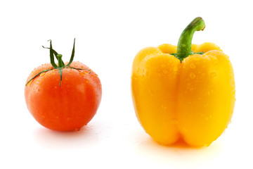Fresh red tomato and yellow pepper