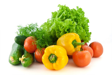 Fresh vegetables for salad on a white background