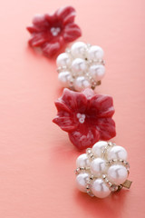 Obraz na płótnie Canvas costume jewel earrings on red