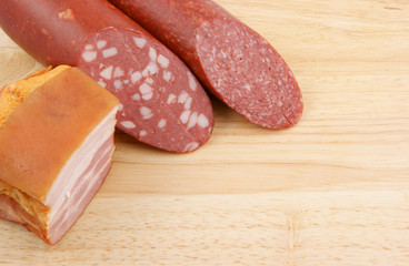 Sausage on wooden background