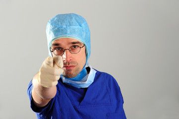 doctor with forefinger up