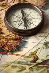 vintage compass on a map