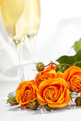 Roses and glasses of champagne
