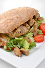 home made bread roll with organic pork goulash