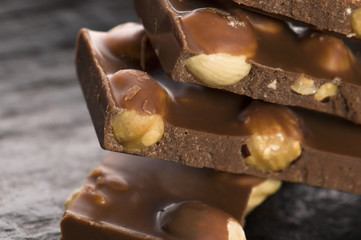 Pile of broken chocolate with nuts