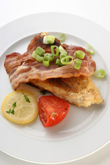 grilled carp steak on organic potato with vegetable