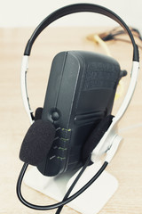 modem with headphones and microphone, selective focus