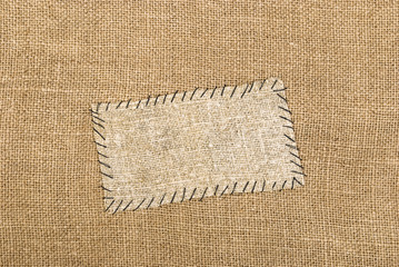 Sackcloth tag on sackcloth material