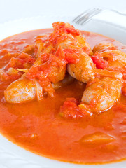 Sausages in tomato sauce.