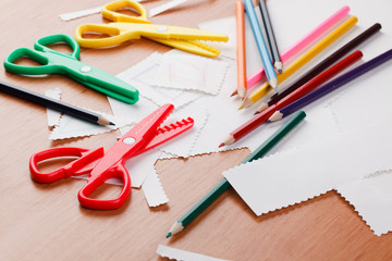 colourful scissors and crayons