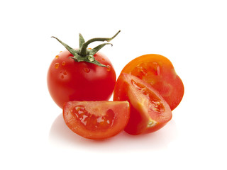 tomato and pieces isolated on white